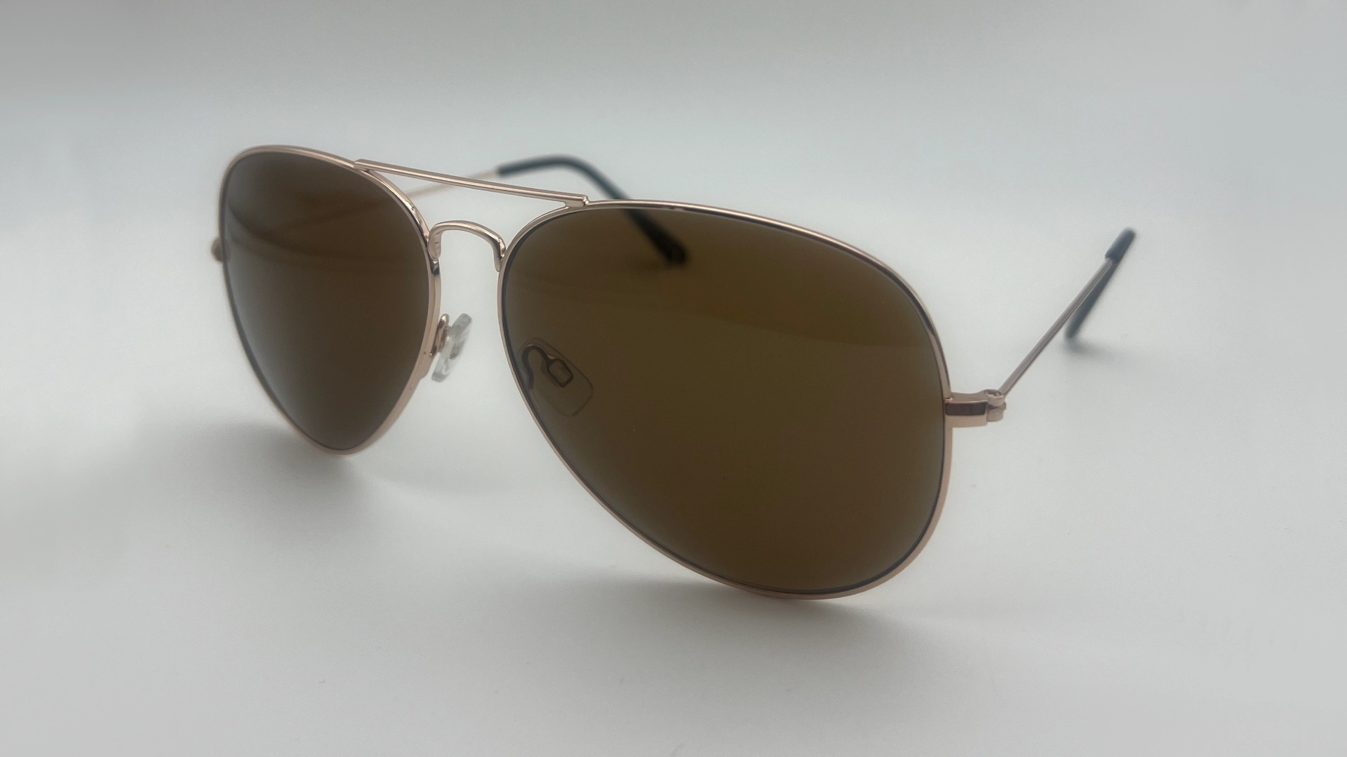 Lunettes de Soleil Aviateur Or Rose Verres Beige Polarisés - Côté Lunettes de soleil aviateur or rose verres beige polarisés vue côté