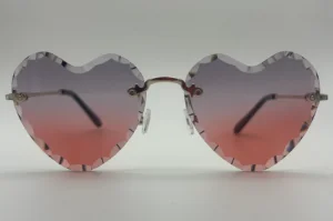 Lunettes de soleil coeur sans monture verres rose dégradé vue face