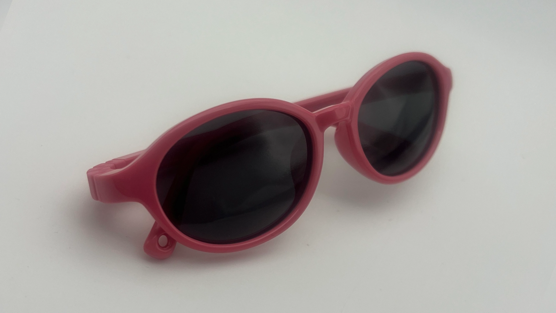Lunettes Enfant Rose - Angle Lunettes de soleil enfant rose verres noirs polarisés vue angle