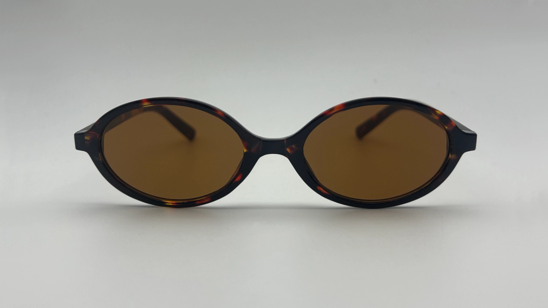 Lunettes Ovales Écaille - Face Lunettes de soleil ovales écaille verres marron vue face