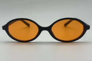 Lunettes de soleil ovales noir verres jaune vue face