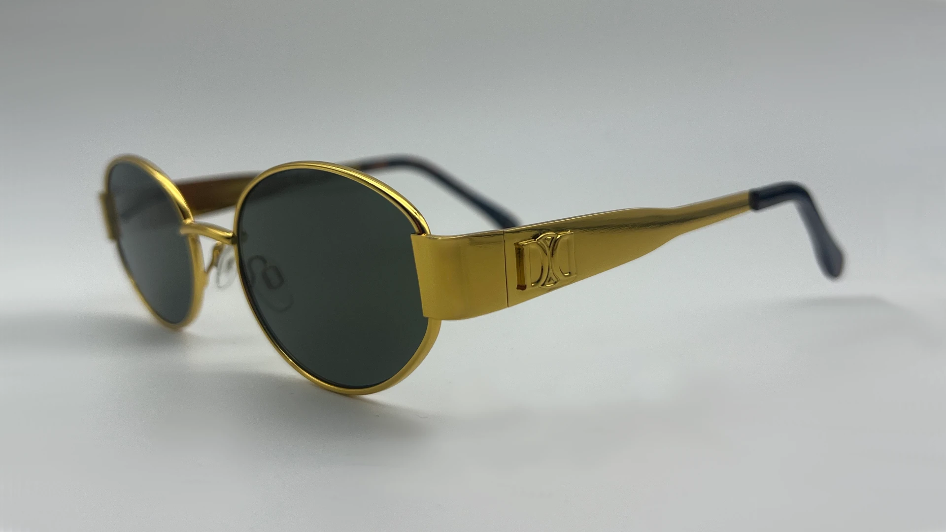 Lunettes Ovales Or Verts - Cote Lunettes de soleil ovales or verres verts vue cote