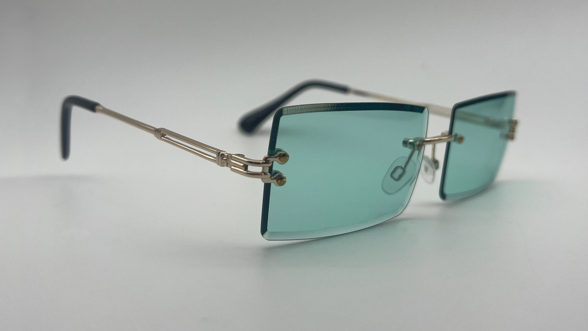 Lunettes Sans Monture Verres Vert Eau - Angle Lunettes de soleil sans monture verres vert eau vue angle