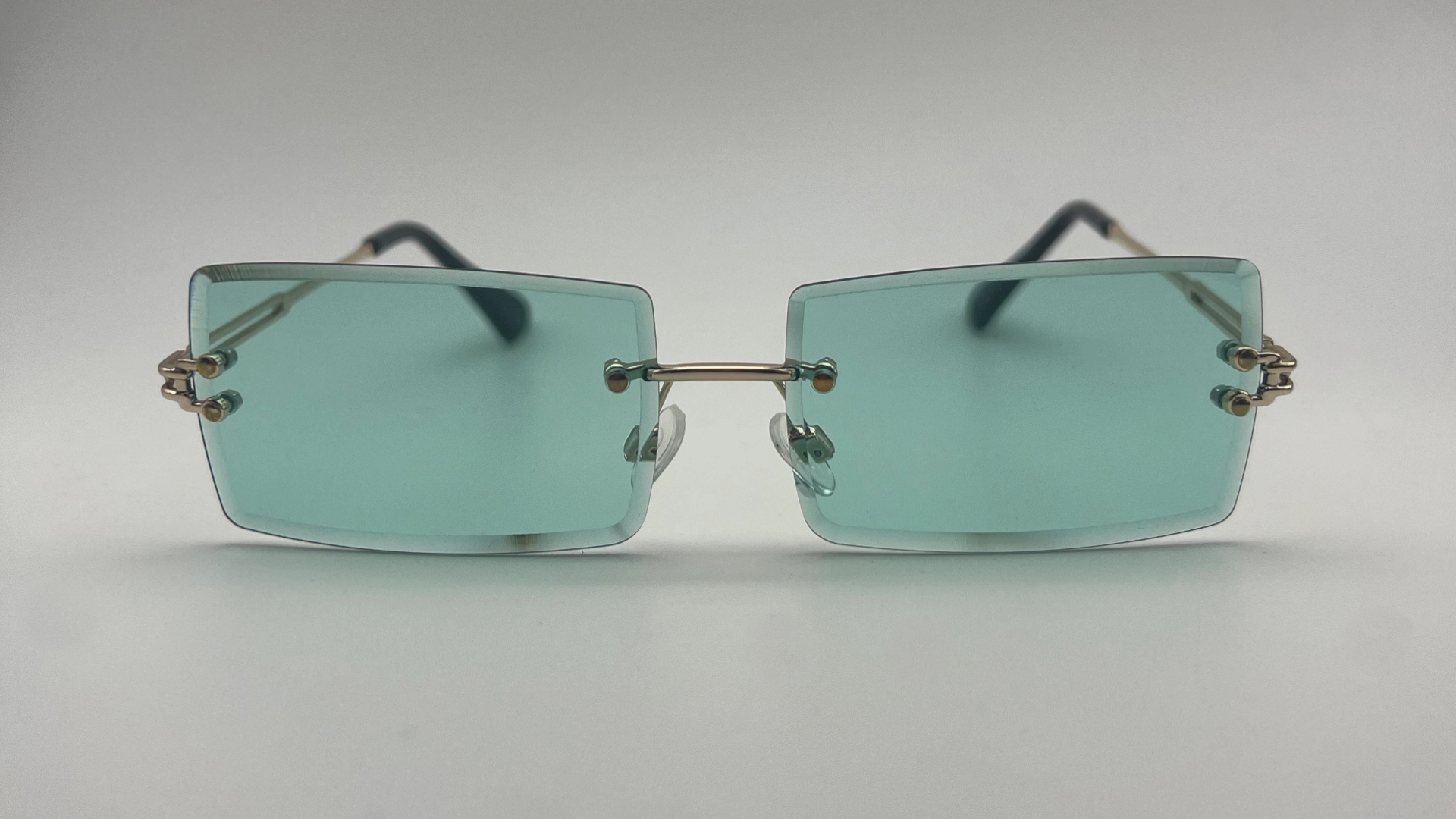 Lunettes Sans Monture Verres Vert Eau - Face Lunettes de soleil sans monture verres vert eau