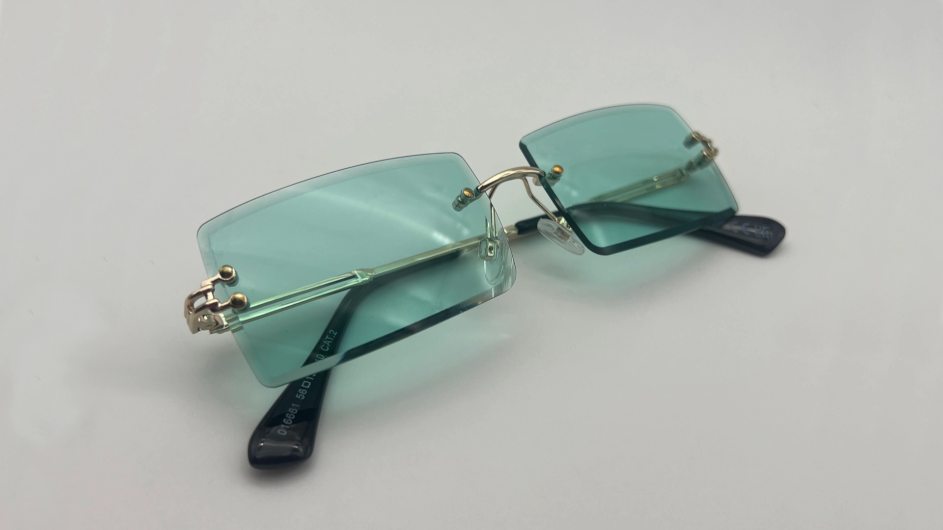 Lunettes Sans Monture Verres Vert Eau - Pliées Lunettes de soleil sans monture verres vert eau pliées