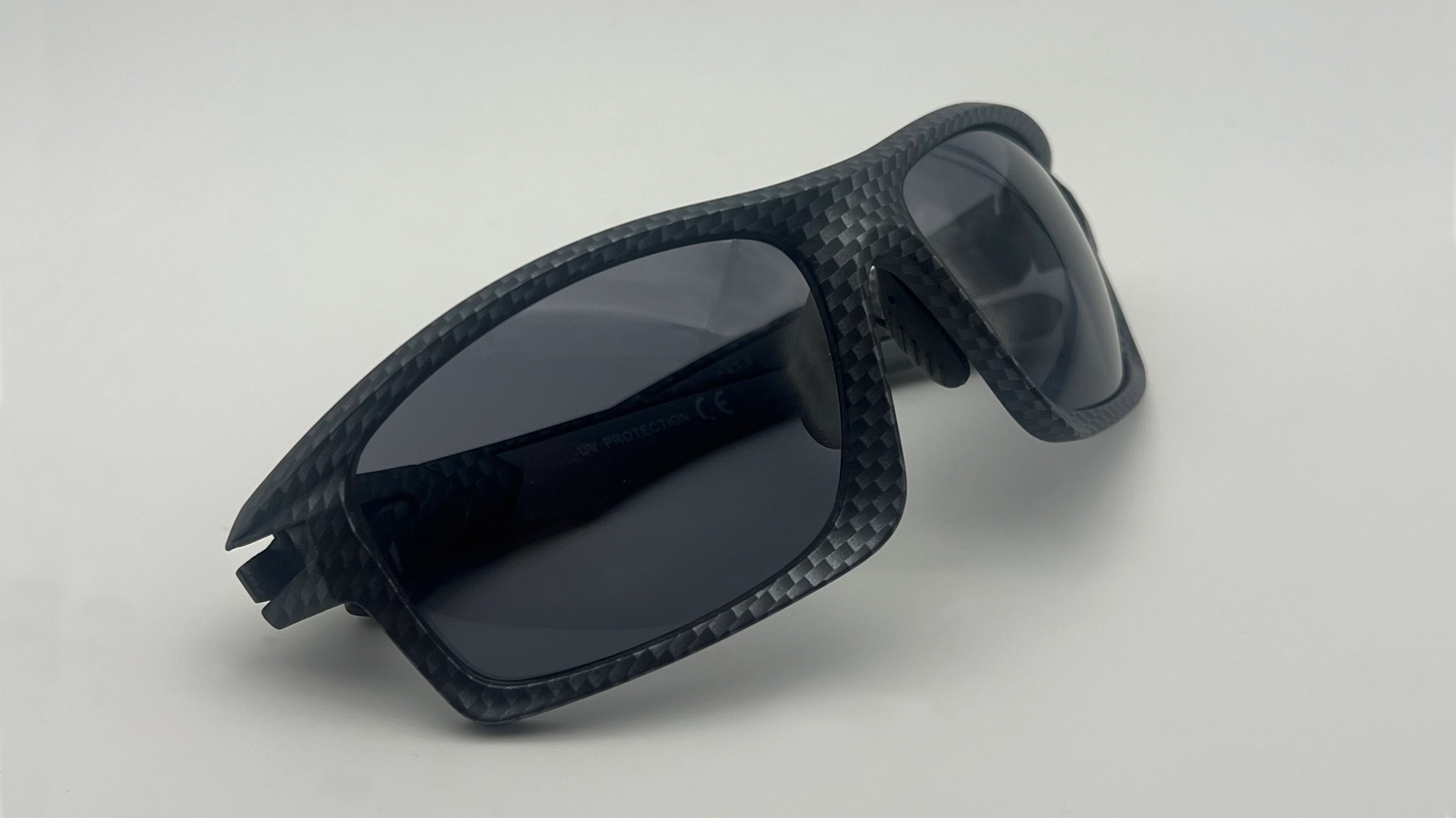 Lunettes Sport Carbone Gris - Pliees Lunettes de soleil sport carbone verres gris polarisés vue pliees